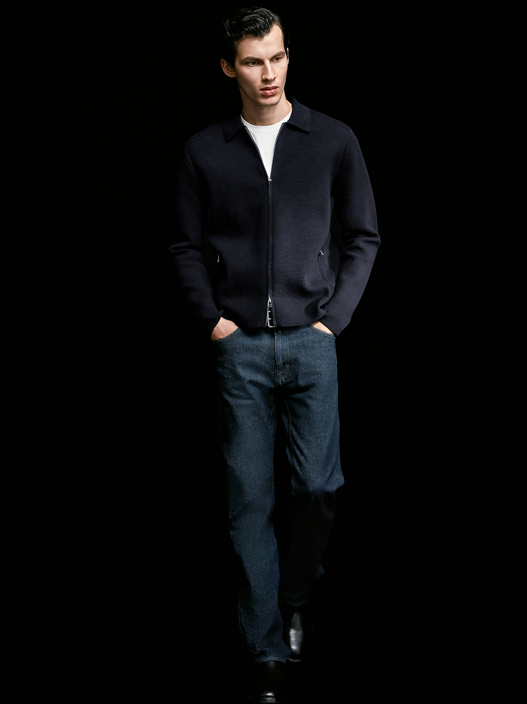 man in knitwear and denim